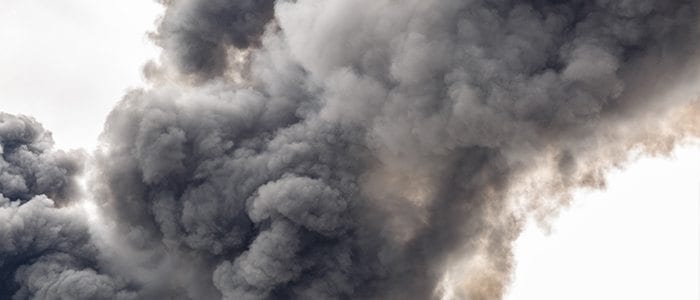 environmental threats to data centers illustrated by a plume of smoke